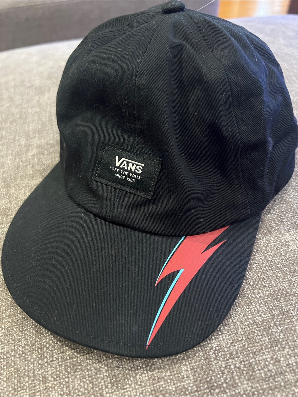 Vans Black Cap with Red Bolt Accent